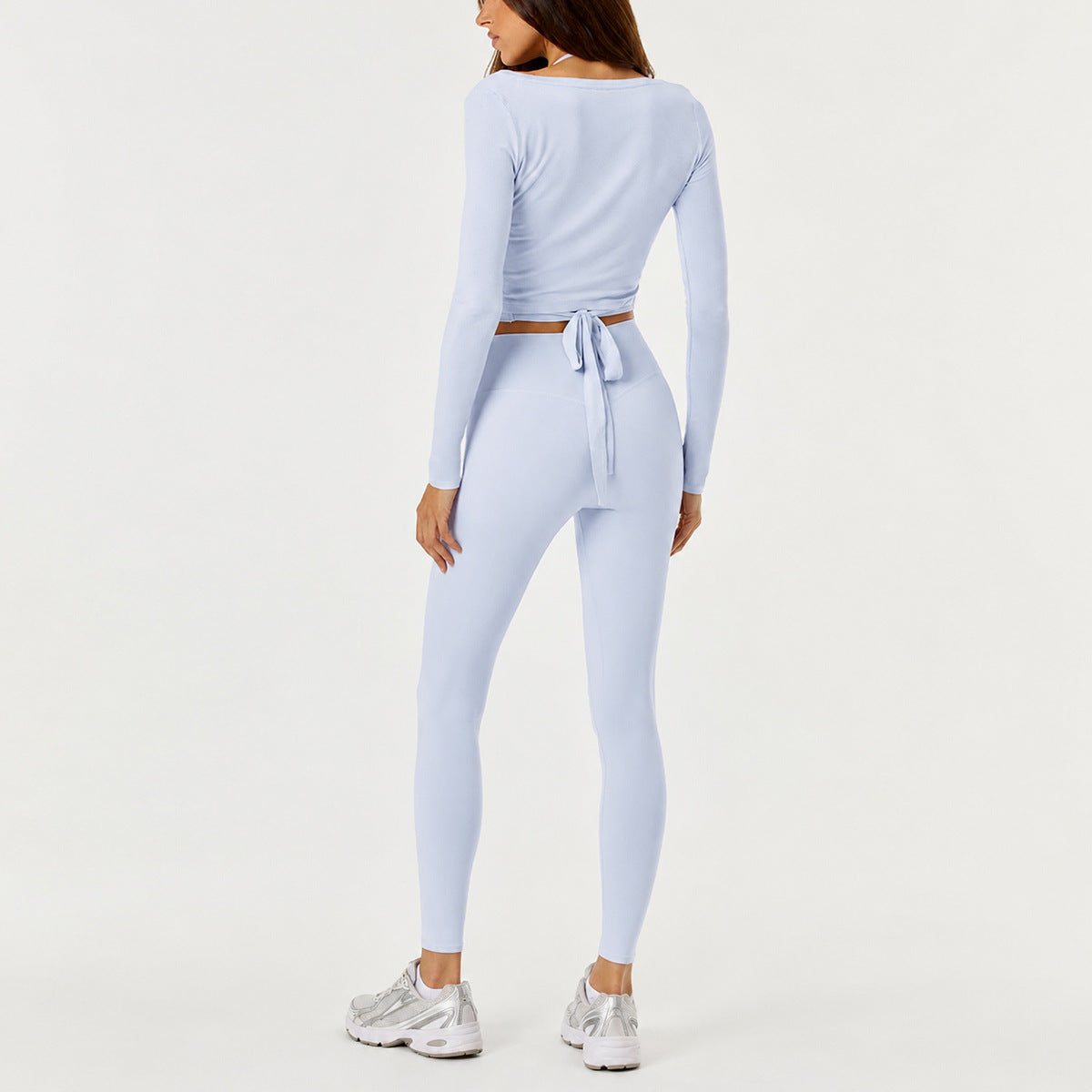 Full Length Sport Yoga Jumpsuit For Women In Stretchy Nylon Fabric Featuring Criss Cross Design With Long Sleeves