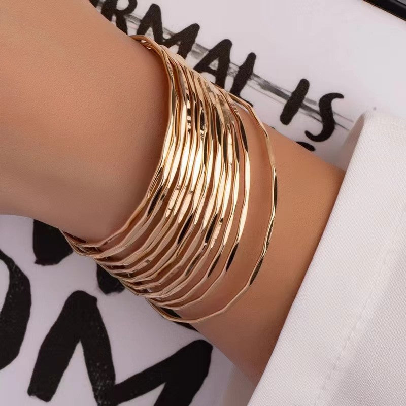 Retro Polka Dots Gold Alloy Bangle For Women With Electroplated Finish