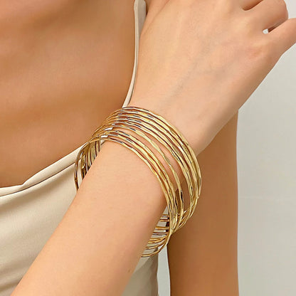Retro Polka Dots Gold Alloy Bangle For Women With Electroplated Finish