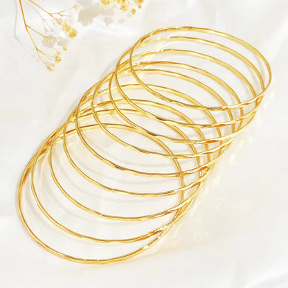 Retro Polka Dots Gold Alloy Bangle For Women With Electroplated Finish
