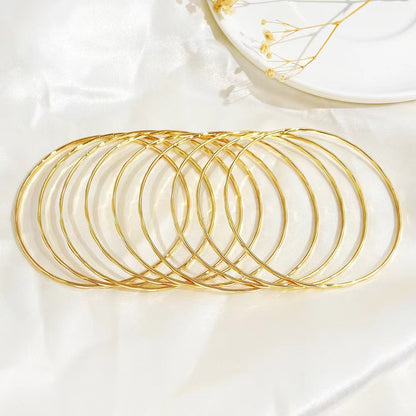 Retro Polka Dots Gold Alloy Bangle For Women With Electroplated Finish