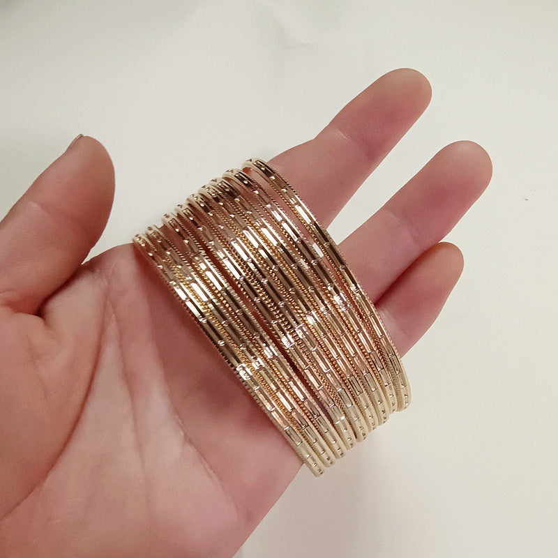 Retro Polka Dots Gold Alloy Bangle For Women With Electroplated Finish