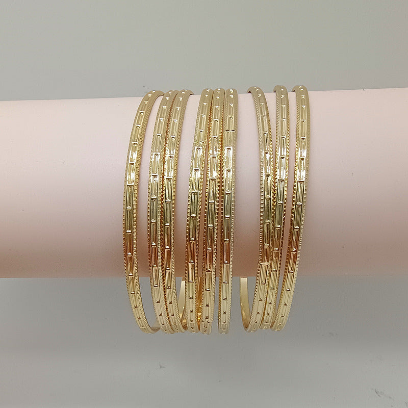 Retro Polka Dots Gold Alloy Bangle For Women With Electroplated Finish