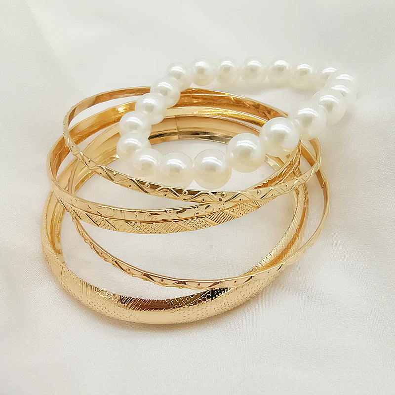 Round Gold Metal Bangle Featuring Electroplated Finish For Elegant Style