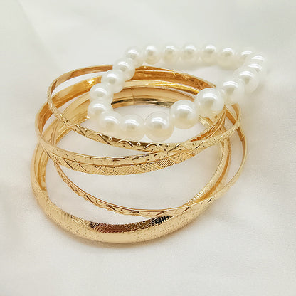 Round Gold Metal Bangle Featuring Electroplated Finish For Elegant Style