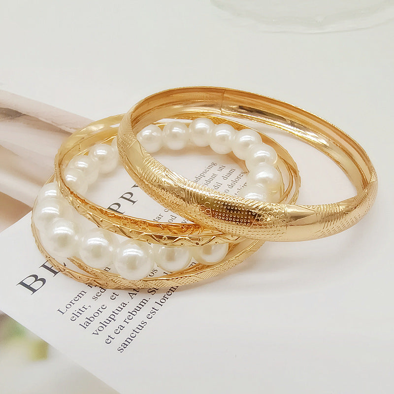 Round Gold Metal Bangle Featuring Electroplated Finish For Elegant Style
