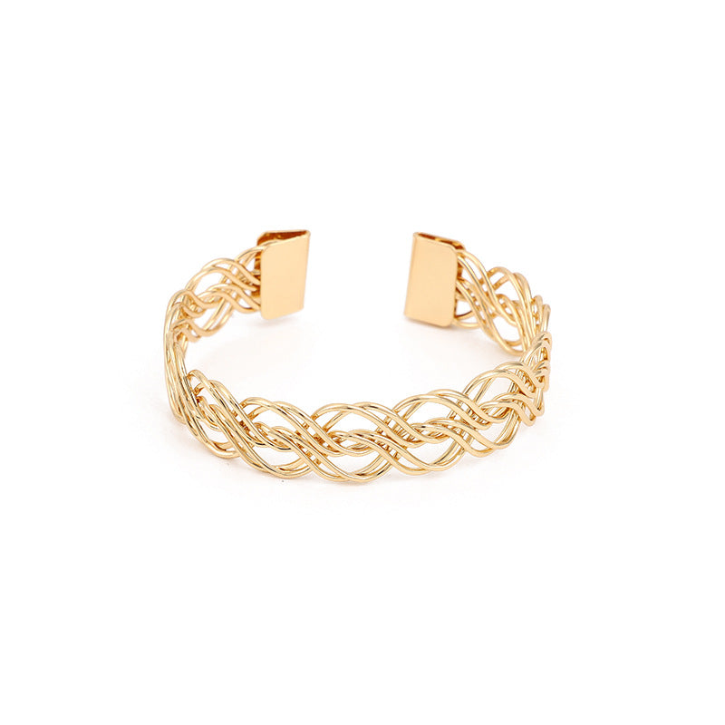 Bohemian Gold Braid Bangle In Metal Featuring Electroplated Golden Plated Finish