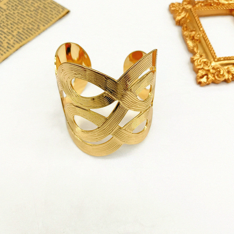 Simple Style Geometric Asymmetrical Bangle In Gold Featuring Electroplated Golden Plated Metal