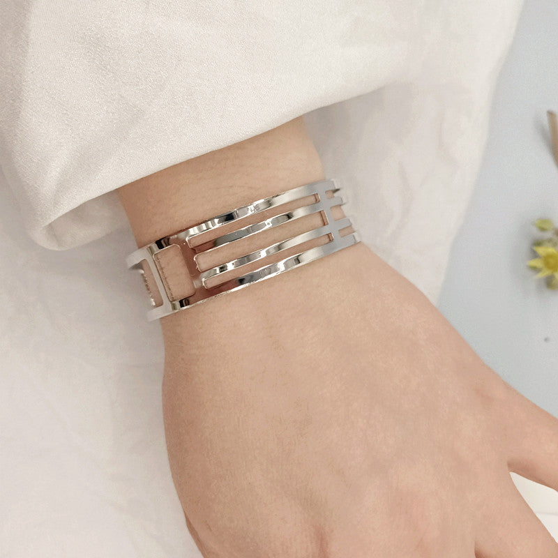 Geometric Punk Gold Bangle Featuring Electroplated Metal Craftsmanship