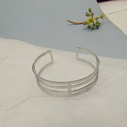 Geometric Punk Gold Bangle Featuring Electroplated Metal Craftsmanship