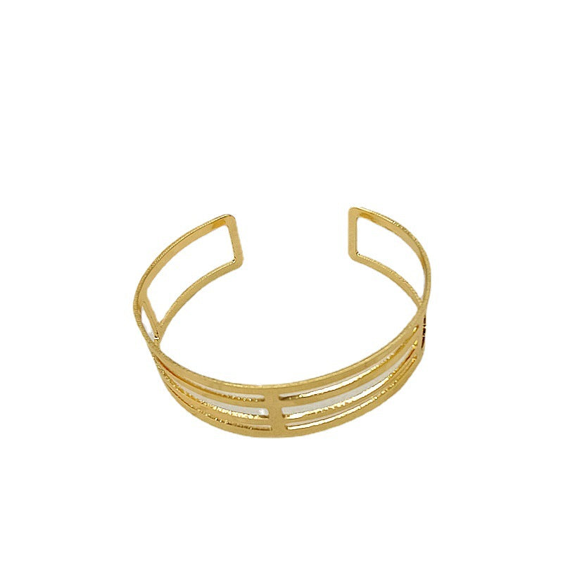Geometric Punk Gold Bangle Featuring Electroplated Metal Craftsmanship