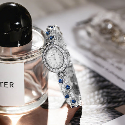 Women's Quartz Watch With Oval Dial, Metal Strap Featuring Jewelry Buckle And Tempered Glass Mirror