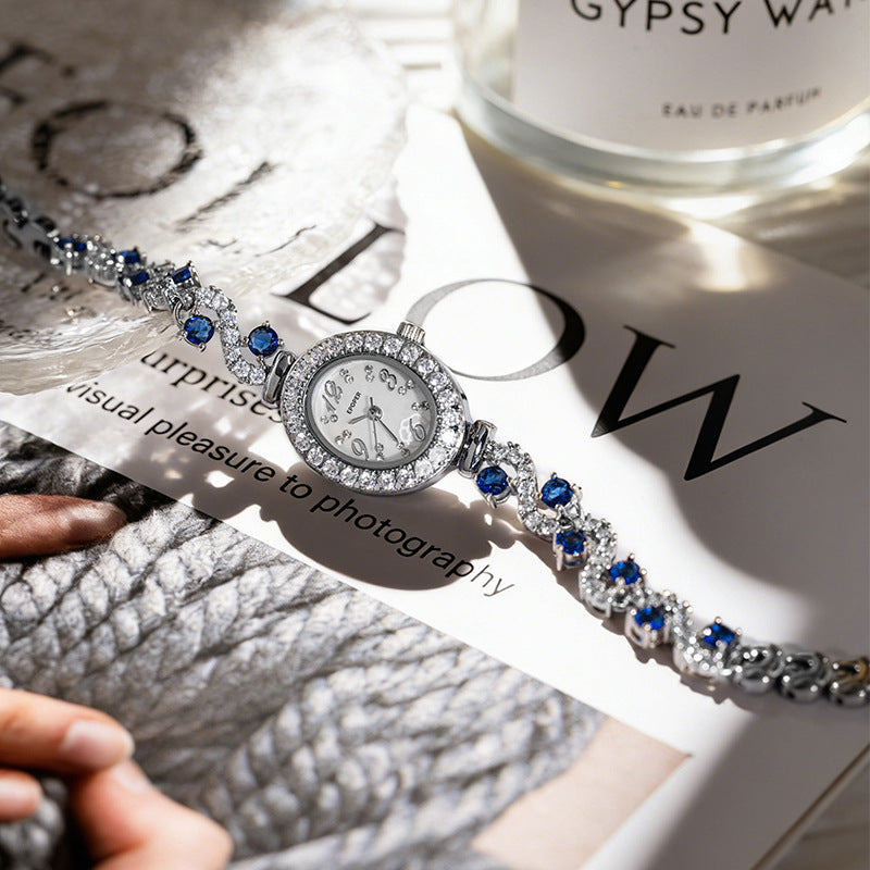 Women's Quartz Watch With Oval Dial, Metal Strap Featuring Jewelry Buckle And Tempered Glass Mirror