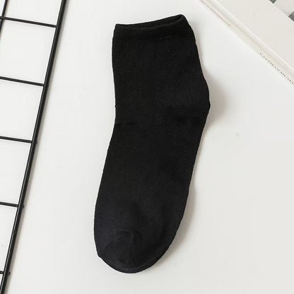 Unisex Casual Solid Color Socks In Dyed Black, Made With Comfortable Polyester Cotton For Spring Wear