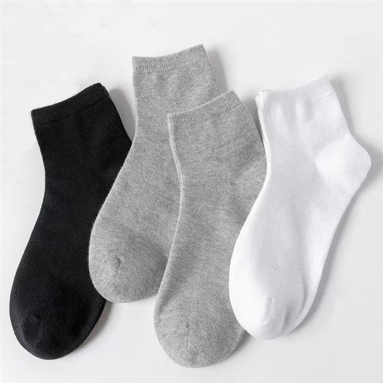 Unisex Casual Solid Color Socks In Dyed Black, Made With Comfortable Polyester Cotton For Spring Wear