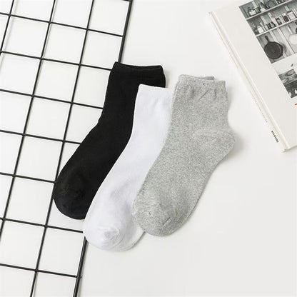Unisex Casual Solid Color Socks In Dyed Black, Made With Comfortable Polyester Cotton For Spring Wear