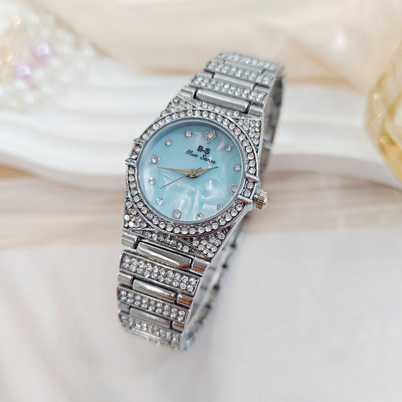 Women's Quartz Watch With Round Dial, Alloy Strap, Single Folding Buckle, And Ordinary Glass Mirror