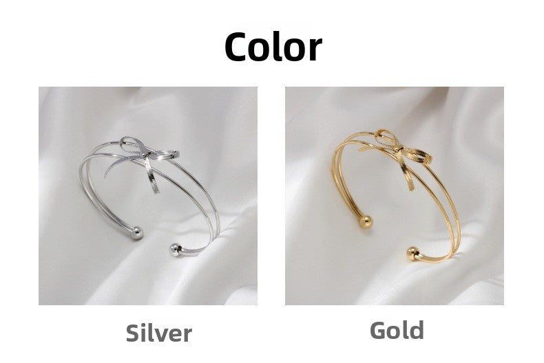 Sweet Style Bow Tie Bangle In Titanium Steel With 18K Real Gold Plated PVD Coating, Available In Gold