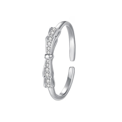 Simple Style Couple Bow Tie Open Rings In S999 Silver With Platinum Plated Electroplated Finish And Zircon Inlay