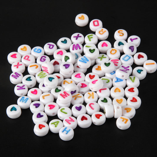 Heart Shape Learning Toy In White Featuring Beads And Threading For Educational Play