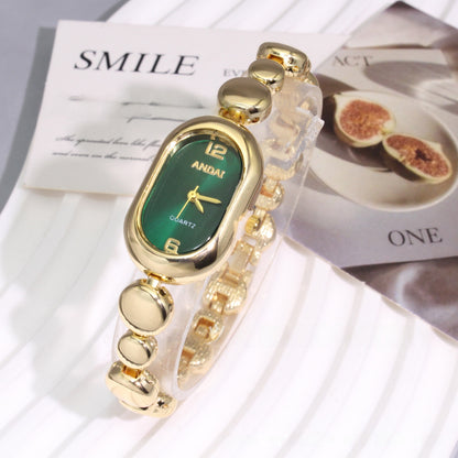 Women's Oval Quartz Watch With Alloy Strap And Jewelry Buckle Featuring Plexiglass Mirror Material