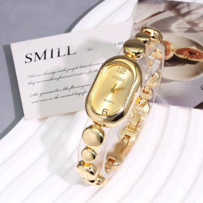 Women's Oval Quartz Watch With Alloy Strap And Jewelry Buckle Featuring Plexiglass Mirror Material