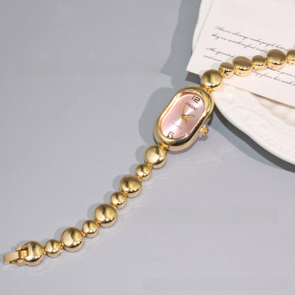 Women's Oval Quartz Watch With Alloy Strap And Jewelry Buckle Featuring Plexiglass Mirror Material