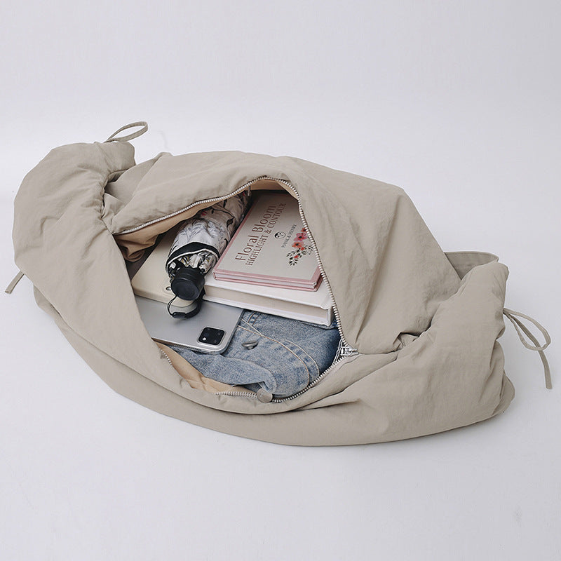 Women’s Nylon Tote Bag With Dumpling Shape Featuring Sewing Thread And Single Shoulder Strap