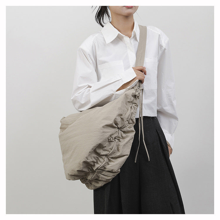 Women’s Nylon Tote Bag With Dumpling Shape Featuring Sewing Thread And Single Shoulder Strap