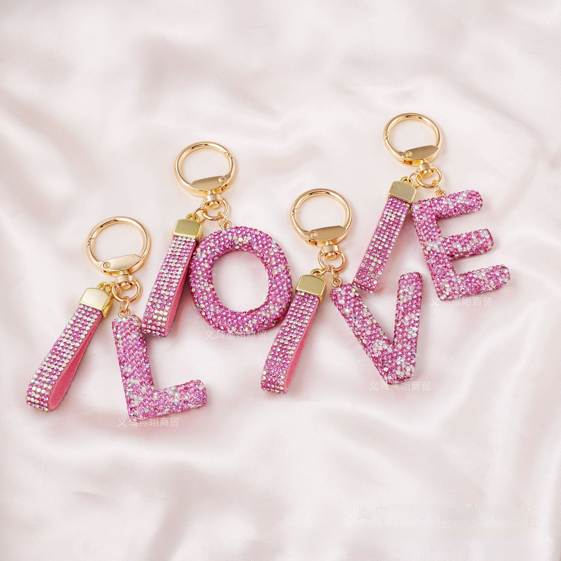 New Year Letter Bag Charm Key Chain In Natural Pink Featuring Pottery Clay And Rhinestone Inlay