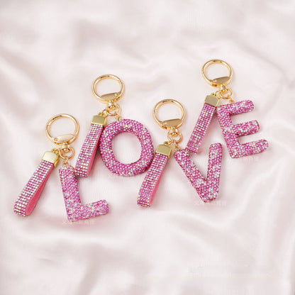 New Year Letter Bag Charm Key Chain In Natural Pink Featuring Pottery Clay And Rhinestone Inlay