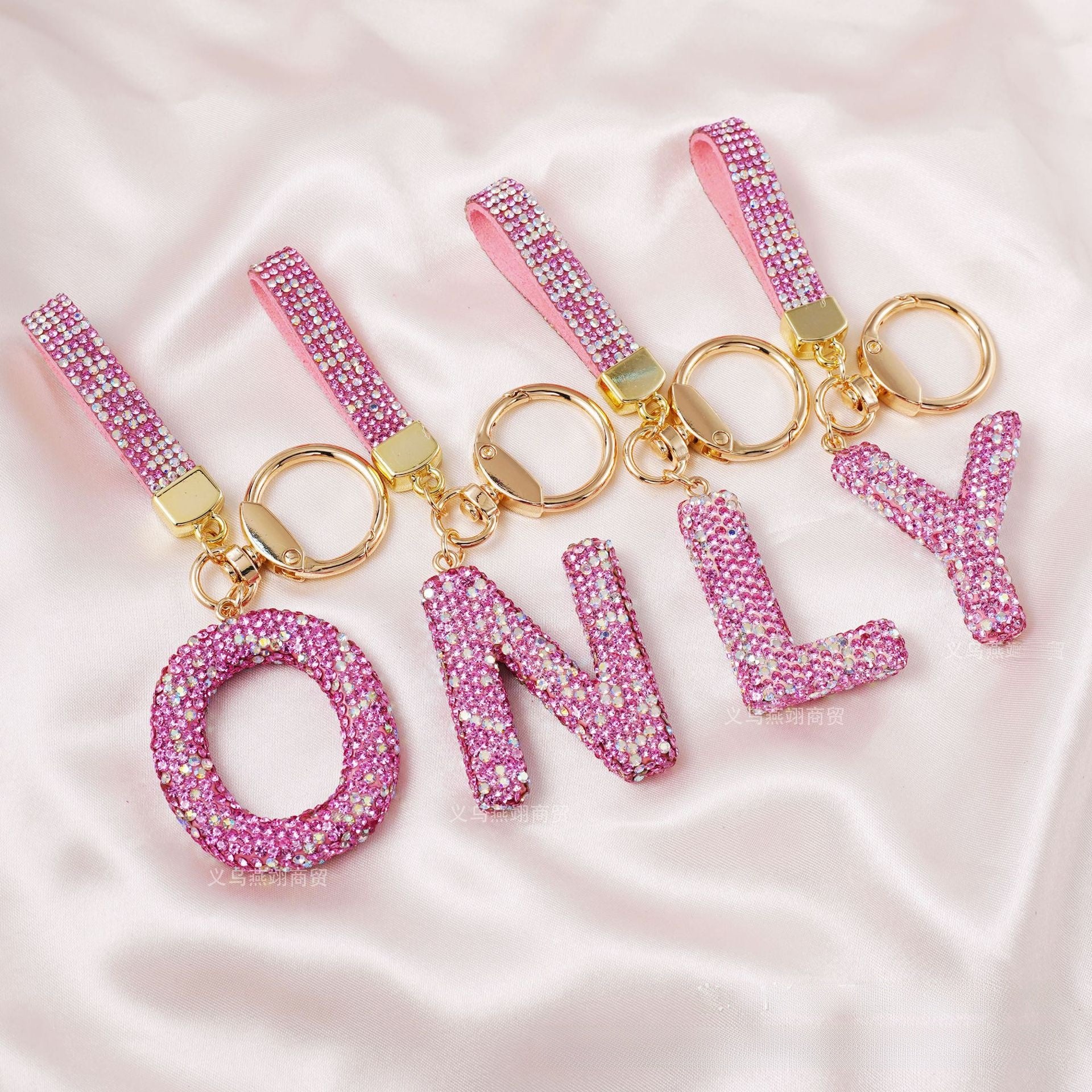 New Year Letter Bag Charm Key Chain In Natural Pink Featuring Pottery Clay And Rhinestone Inlay