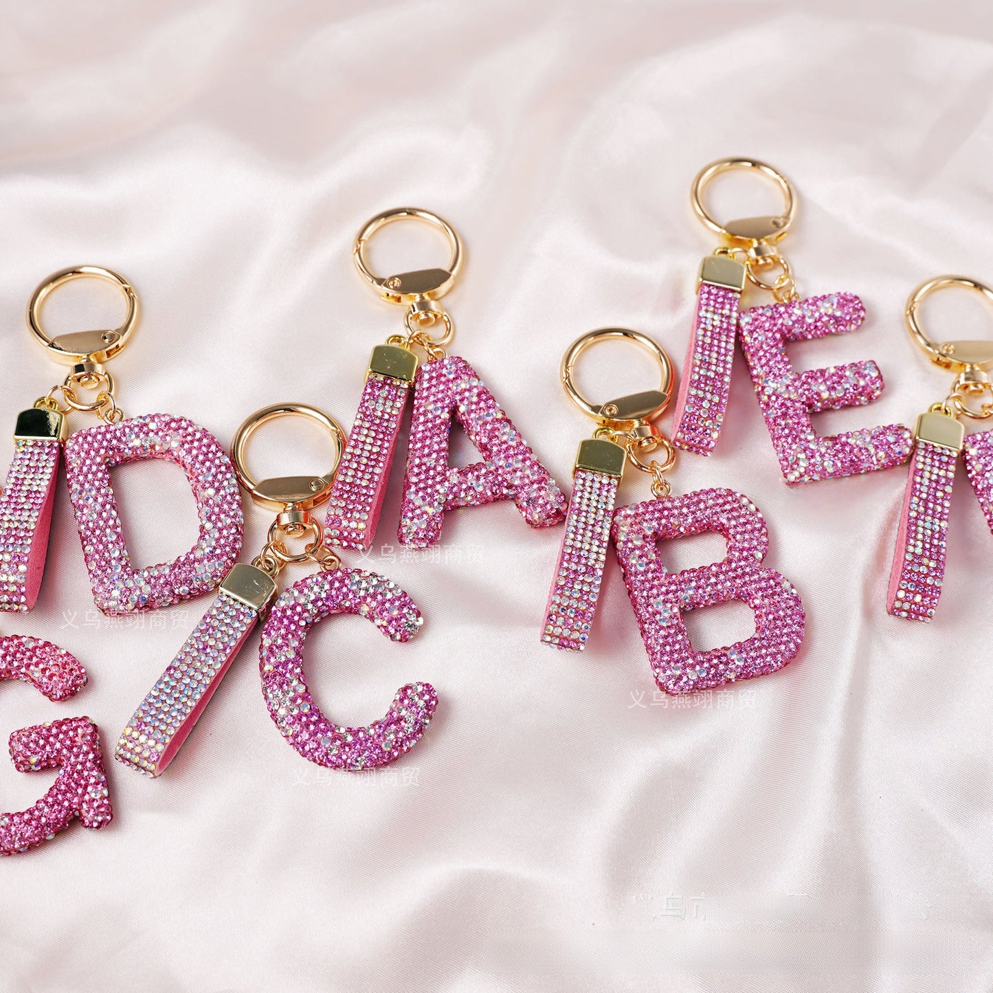 New Year Letter Bag Charm Key Chain In Natural Pink Featuring Pottery Clay And Rhinestone Inlay