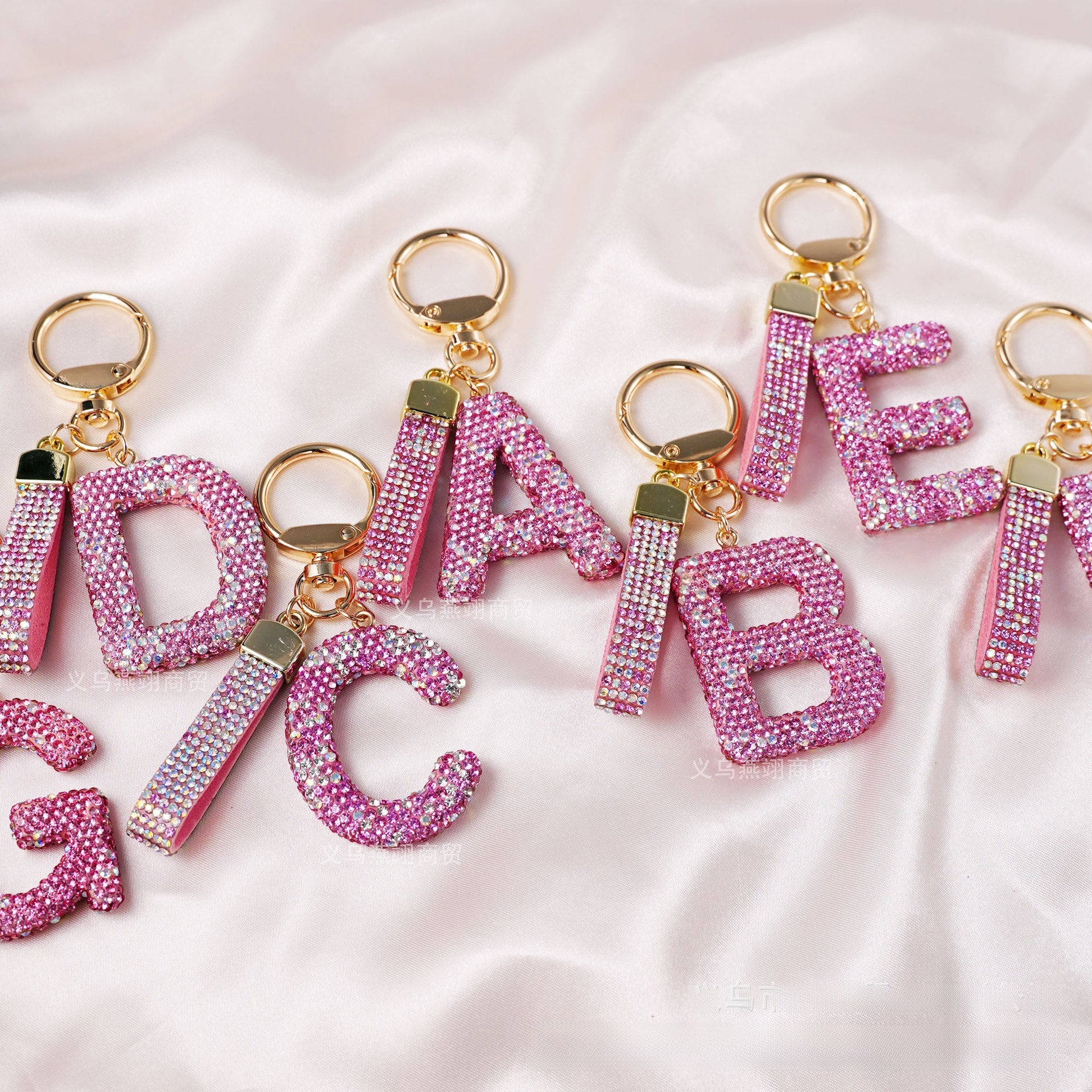 New Year Letter Bag Charm Key Chain In Natural Pink Featuring Pottery Clay And Rhinestone Inlay