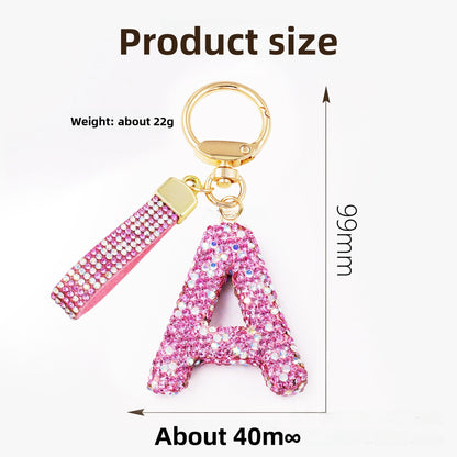 New Year Letter Bag Charm Key Chain In Natural Pink Featuring Pottery Clay And Rhinestone Inlay
