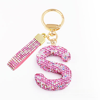 New Year Letter Bag Charm Key Chain In Natural Pink Featuring Pottery Clay And Rhinestone Inlay