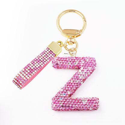 New Year Letter Bag Charm Key Chain In Natural Pink Featuring Pottery Clay And Rhinestone Inlay