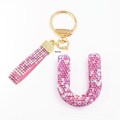 New Year Letter Bag Charm Key Chain In Natural Pink Featuring Pottery Clay And Rhinestone Inlay