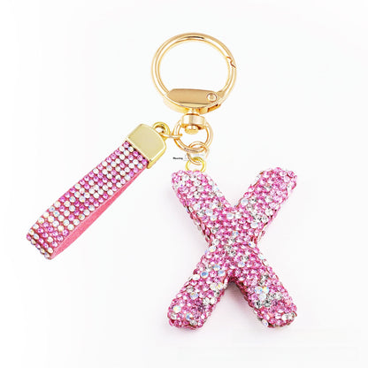 New Year Letter Bag Charm Key Chain In Natural Pink Featuring Pottery Clay And Rhinestone Inlay