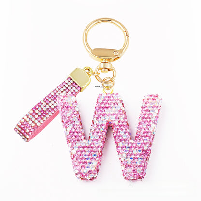 New Year Letter Bag Charm Key Chain In Natural Pink Featuring Pottery Clay And Rhinestone Inlay
