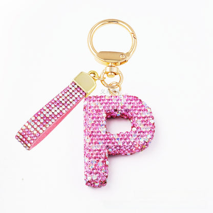 New Year Letter Bag Charm Key Chain In Natural Pink Featuring Pottery Clay And Rhinestone Inlay