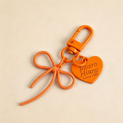 Bow Tie Bag Charm Key Chain In Colour, Featuring Durable Alloy Material