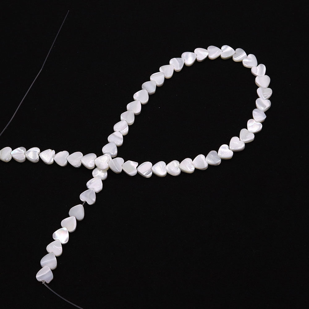 Heart Shape Shell Beads With 4mm Diameter Featuring Carving Craftsmanship And Center-Drilled Design In Marine Style