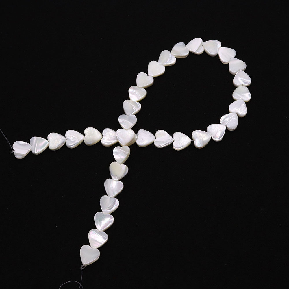 Heart Shape Shell Beads With 4mm Diameter Featuring Carving Craftsmanship And Center-Drilled Design In Marine Style