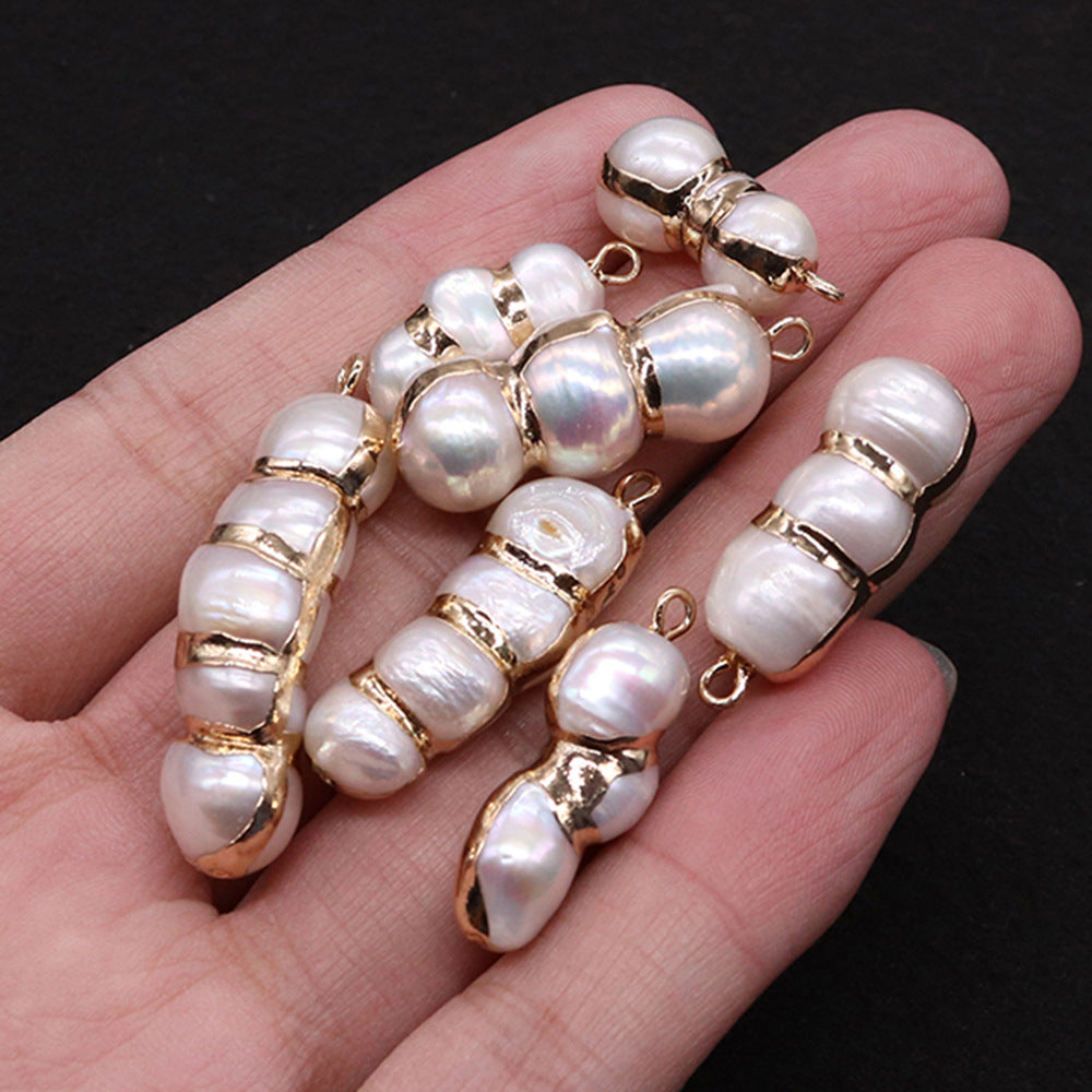 Peanut Pendant Featuring Polished Freshwater Pearl Inlay In Natural Baroque Style