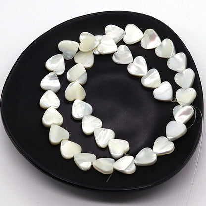 Heart Shape Shell Beads With 4mm Diameter Featuring Carving Craftsmanship And Center-Drilled Design In Marine Style
