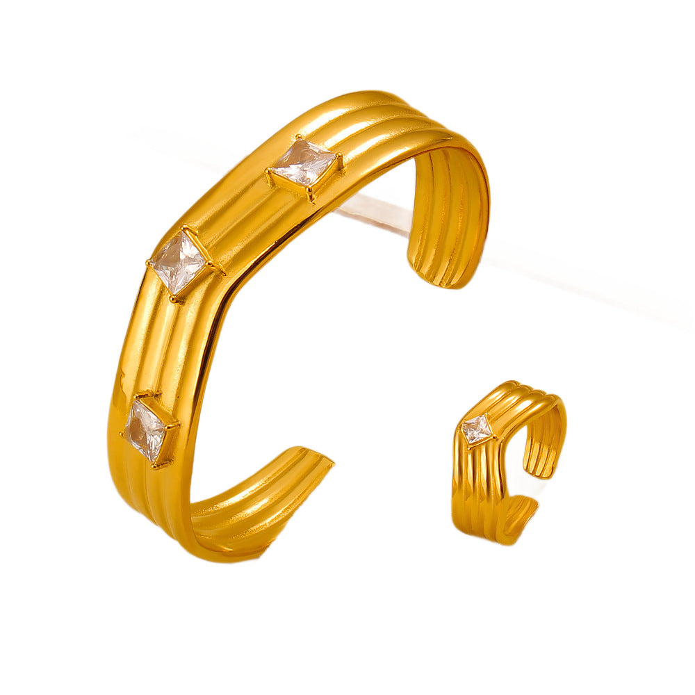 Women’s Titanium Steel Bangle With Golden Plated Finish And Zircon Inlay Featuring Elegant Line Pattern
