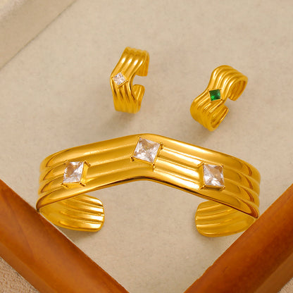 Women’s Titanium Steel Bangle With Golden Plated Finish And Zircon Inlay Featuring Elegant Line Pattern