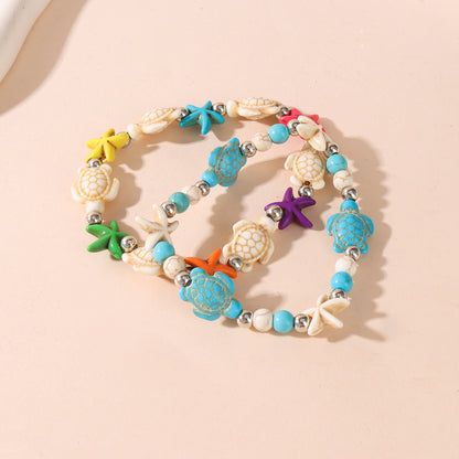 Unisex Marine Style Bracelet Featuring Tortoise Pattern And Turquoise Beads On Elastic String With Beaded Chain Craftsmanship