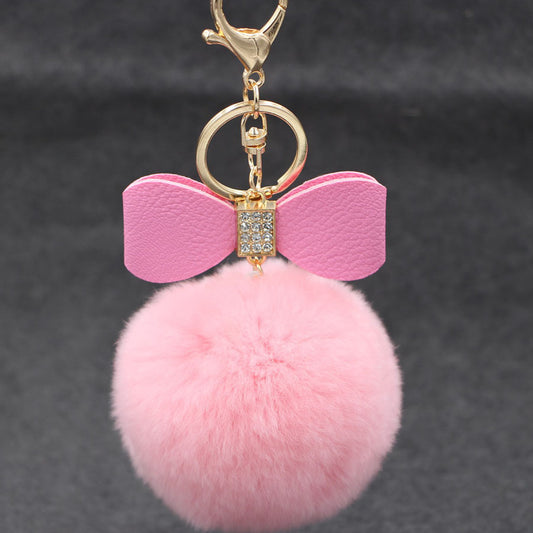 Natural Pink Bow Tie Bag Charm Key Chain Featuring Plush Material And Rhinestone Inlay
